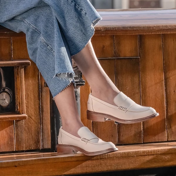 Featuring the Meryl loafer in white. Shop Meryl.